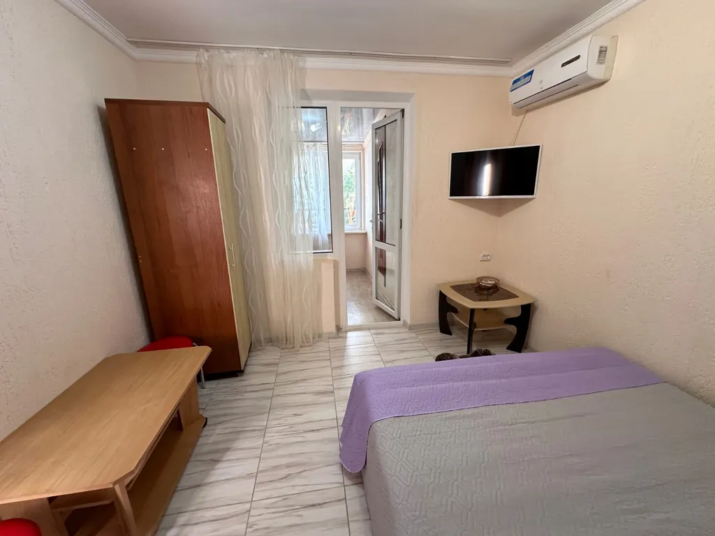 Трехспальный улучшений номер с видом на море