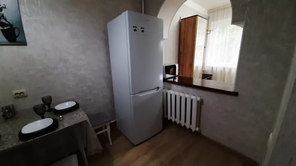 Уютный дом в центре города с местом для парковки автомобиля