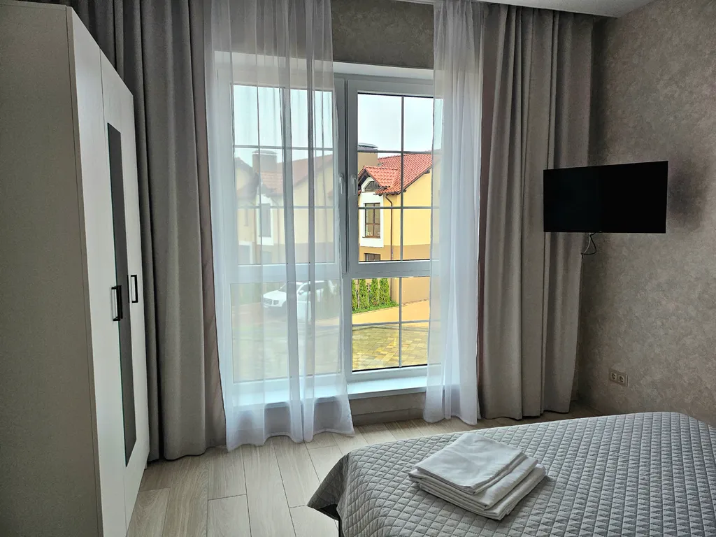 Домик у моря с зоной барбекю