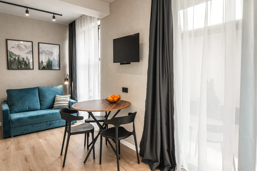 Апартаменты с отдельной спальней  с видом на горы