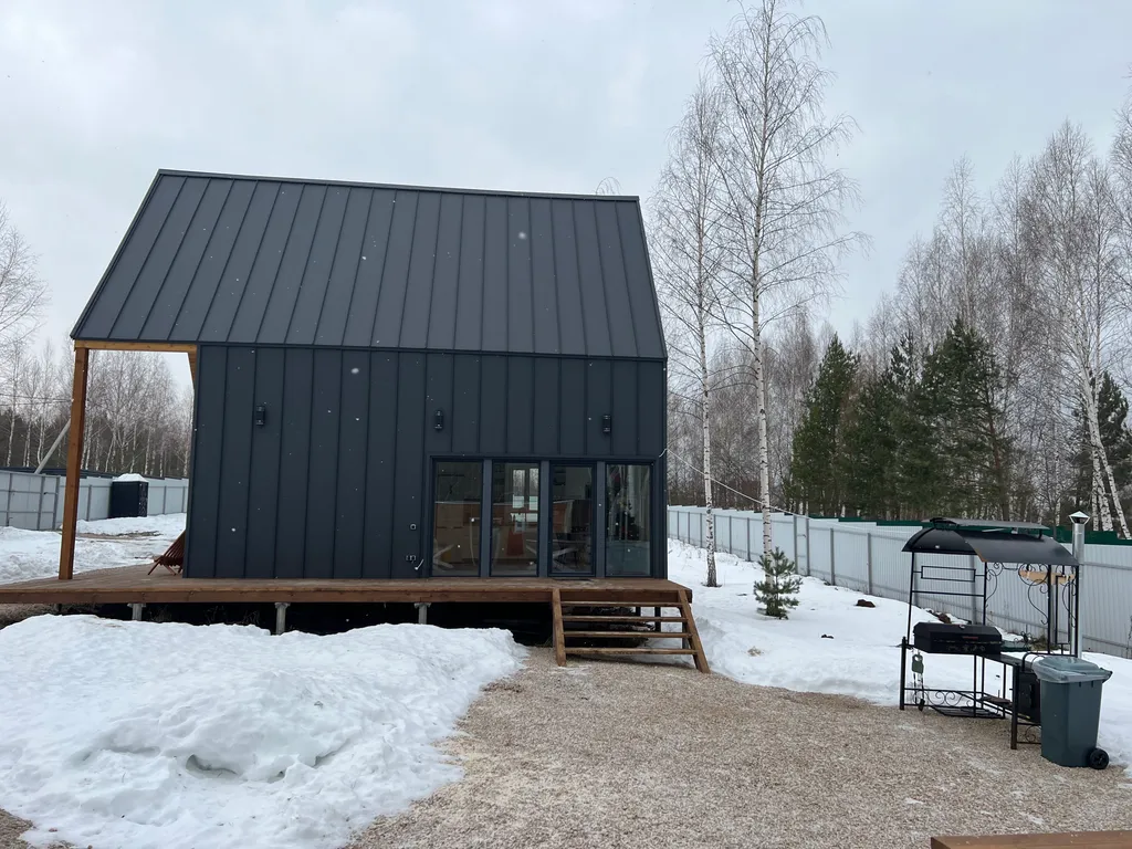 Дом в стиле Барнхаус на берегу реки Ока