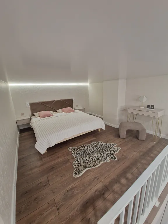 Уютная двухуровневая студия в центре