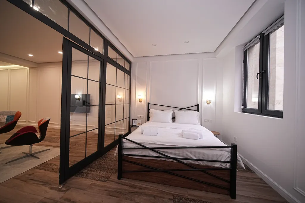 Дизайнерские апартаменты в центре города с 2-мя спальнями