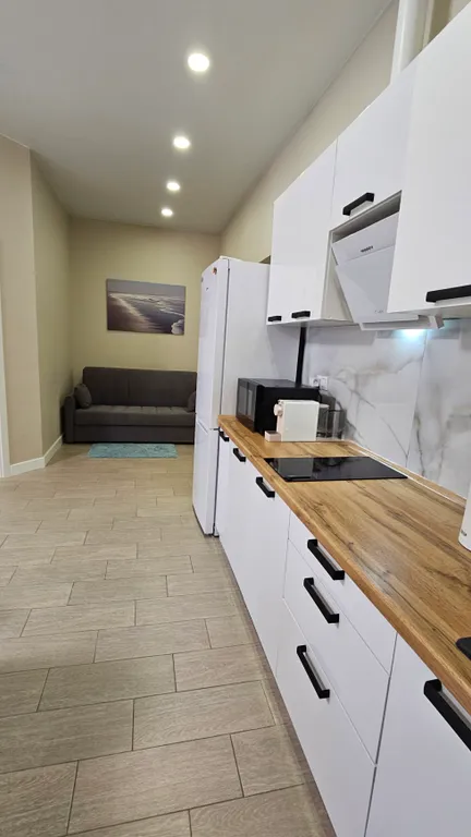 Апартаменты в доме на пляже