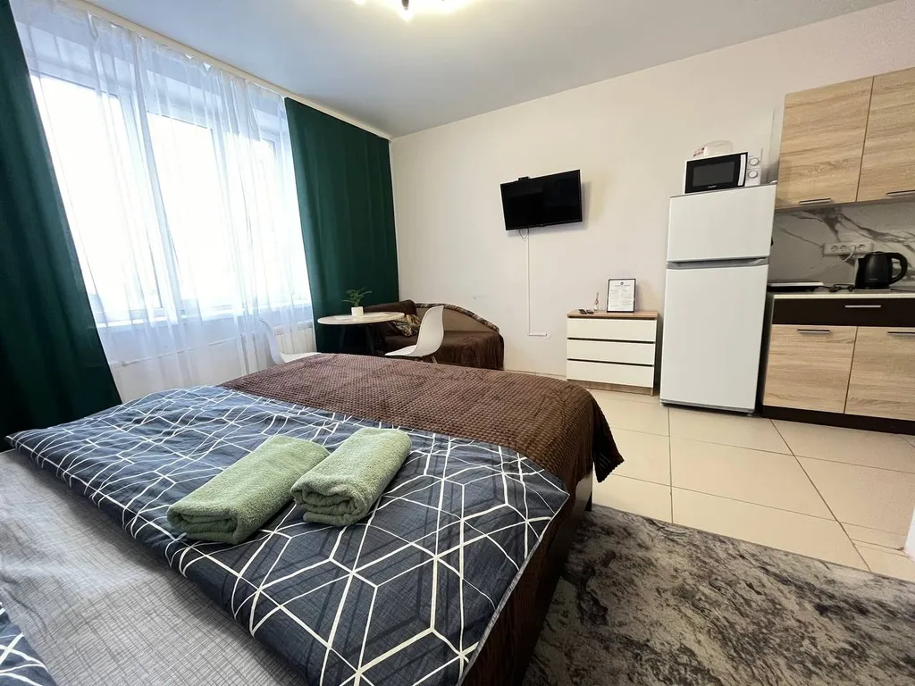 Квартира Уютные апартаменты около ТЦ Изумрудный город — аренда посуточно в Томск