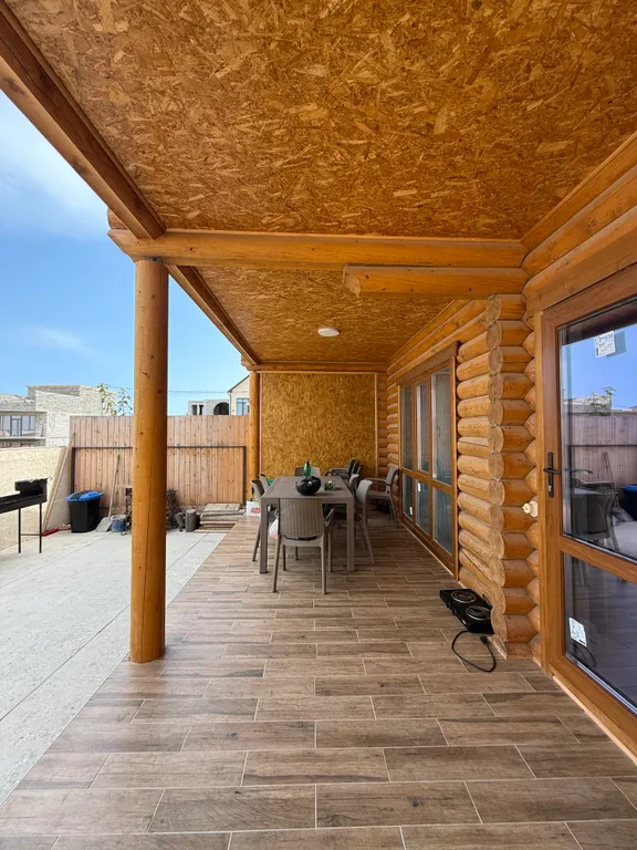 Дом из брусьев с сауной и с видом на море