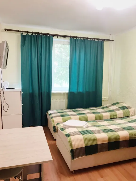 Уютная квартира-студия с двумя кроватями