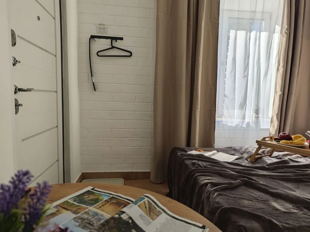 Уютная студия на двоих с кроватью-трансформером