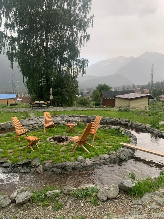 Коттедж с панорамными окнами и видом на горы