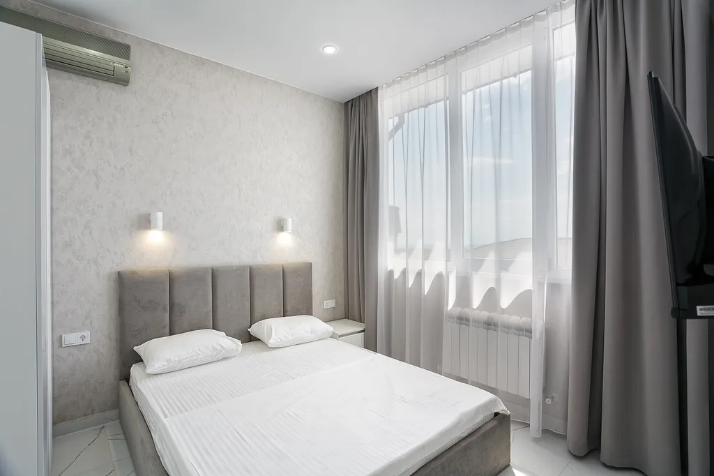 Апартаменты с двумя спальнями с бассейном на территории