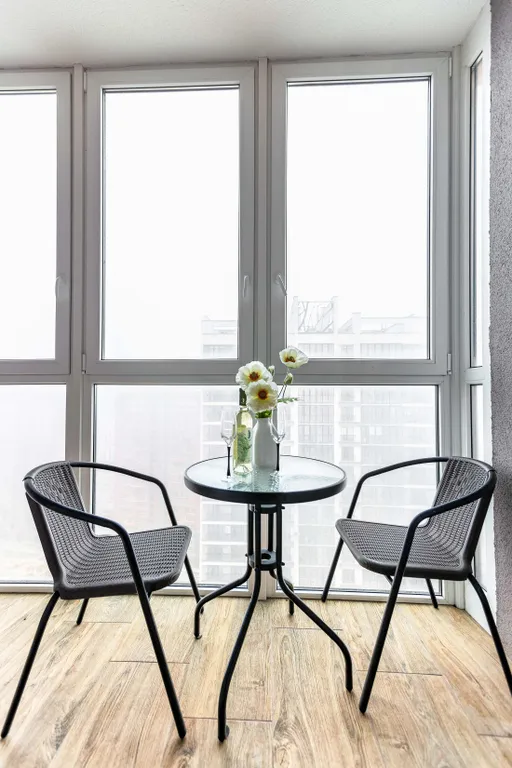 Светлые апартаменты с балконом в Минск мире