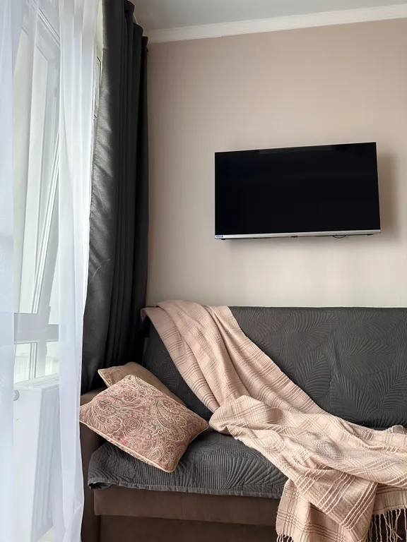 Уютная студия с большим балконом