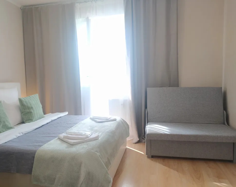 Апартаменты с панорамным балконом для отдыха семьей и командированных