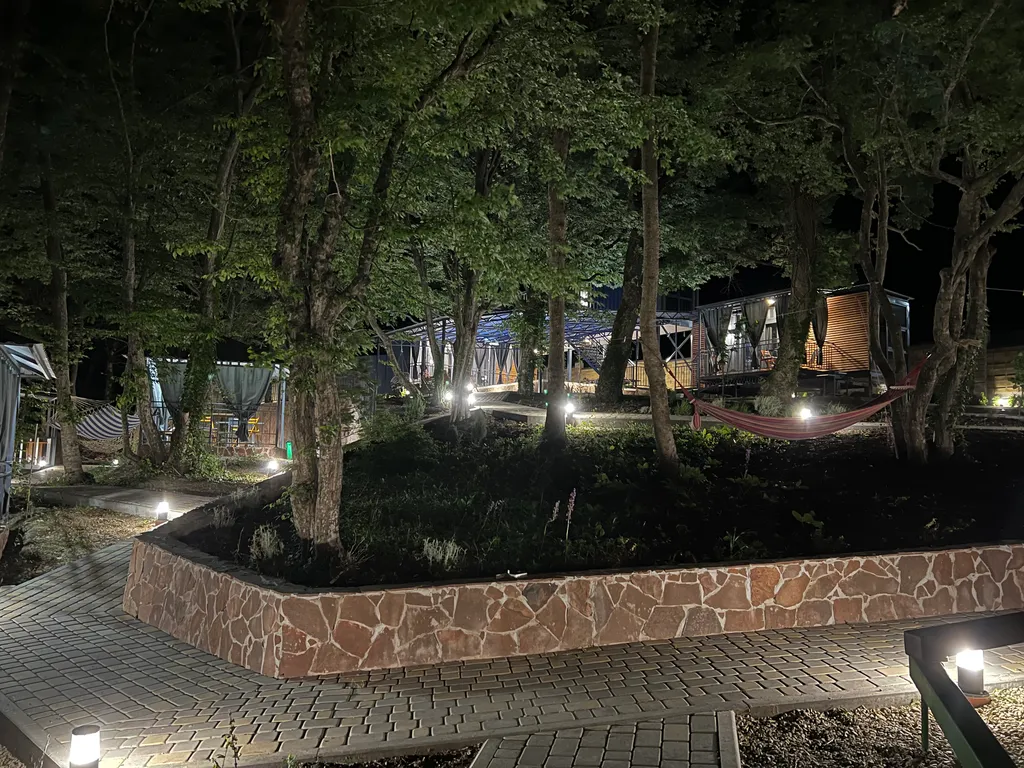 Домик в лесу с большой верандой