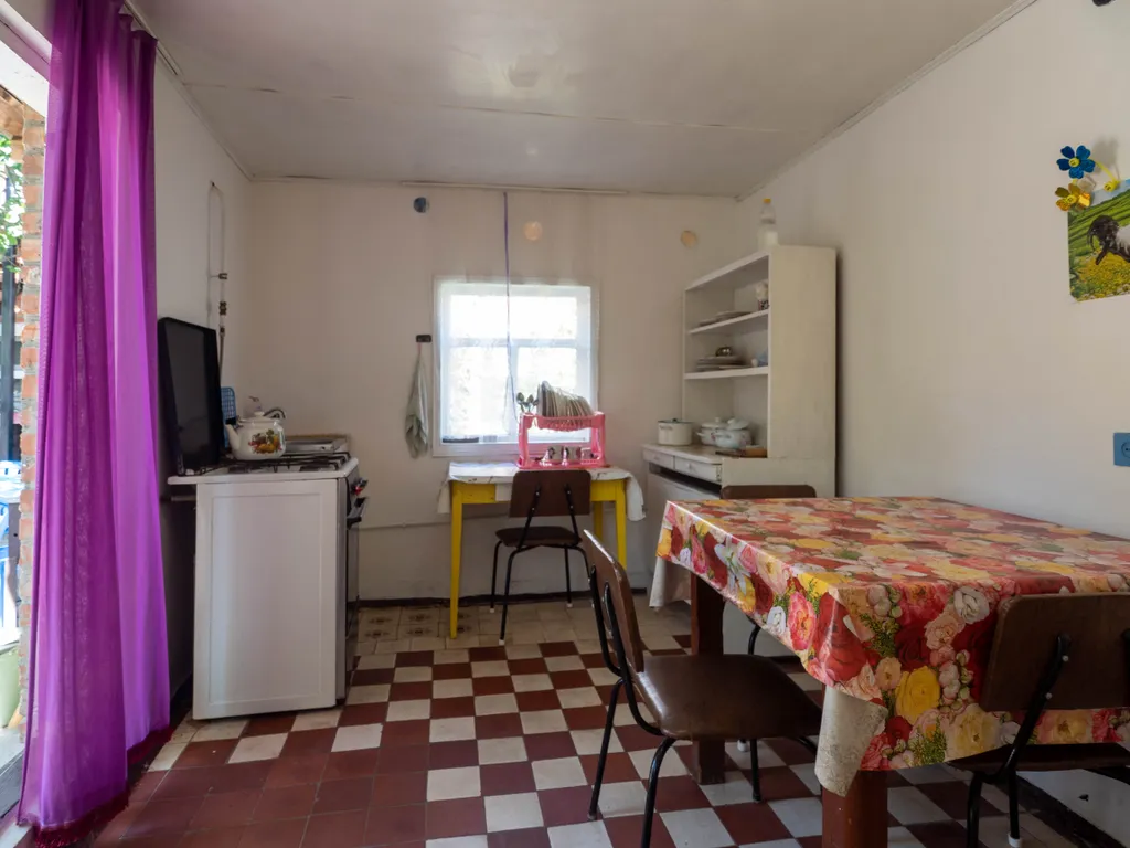 Уютная комната в тени винограда