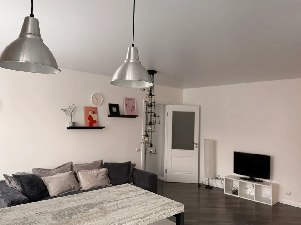 Уютная квартира-студия с отдельной спальней в самом центре города