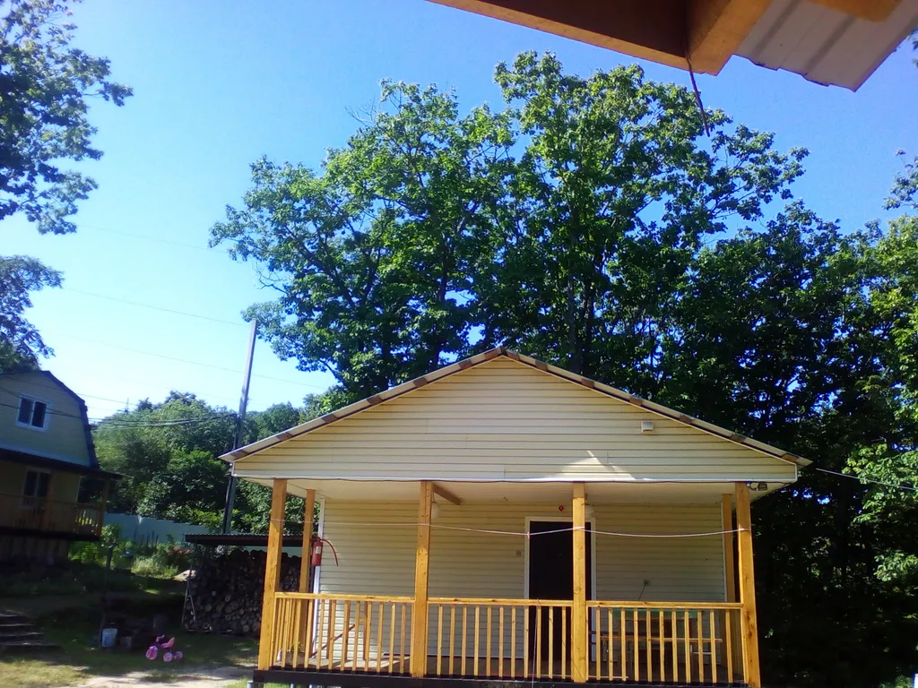 Теплый зимой, уютный летом коттедж