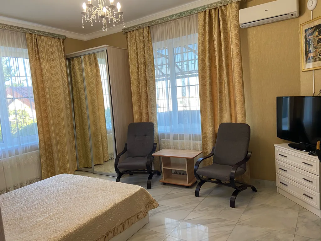 Апартаменты с личной террасой и кухней для семьи из 4 человек