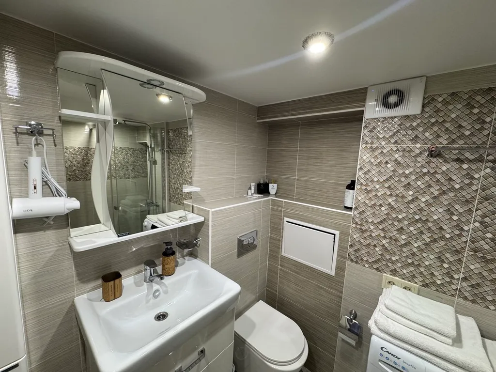 Двухуровневая стильная и комфортабельная квартира