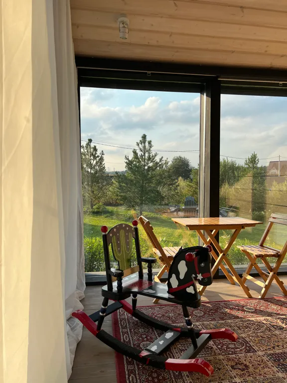 Дача в лесу с панорамными окнами