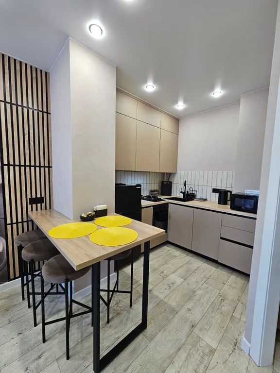 Дизайнерская квартира с посудомоечной машиной и в 10 минутах от центра