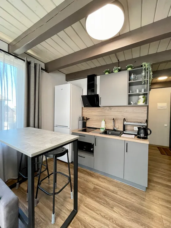 Уютная двухуровневая квартира с видом на горы