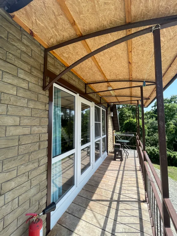 Уютный дом с видом на море и лес