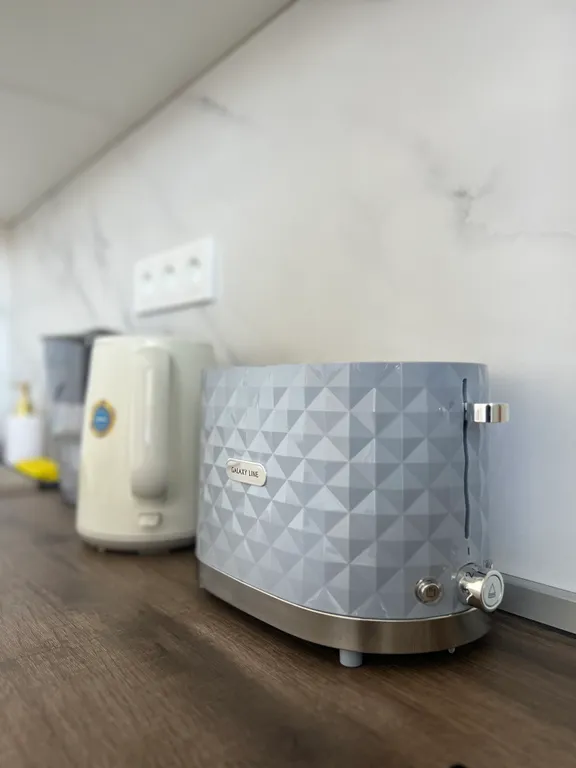 Уютная светлая квартира Аквамарин в новом развитом районе города