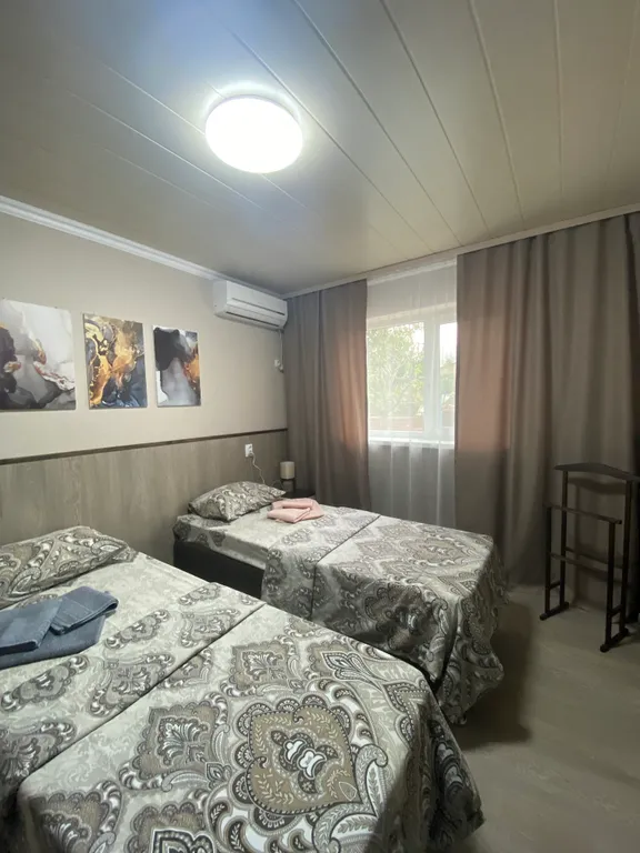 Квартира Уютный номер с двумя отдельными кроватями — аренда посуточно в Новомихайловский