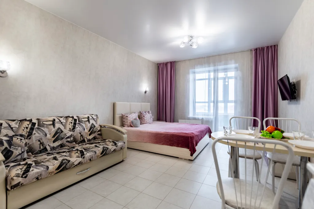 Просторная студия с отличным видом на город