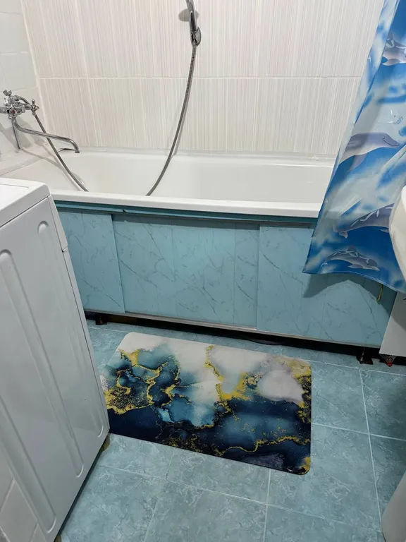 Трёхкомнатная двухуровневая квартира в центре города