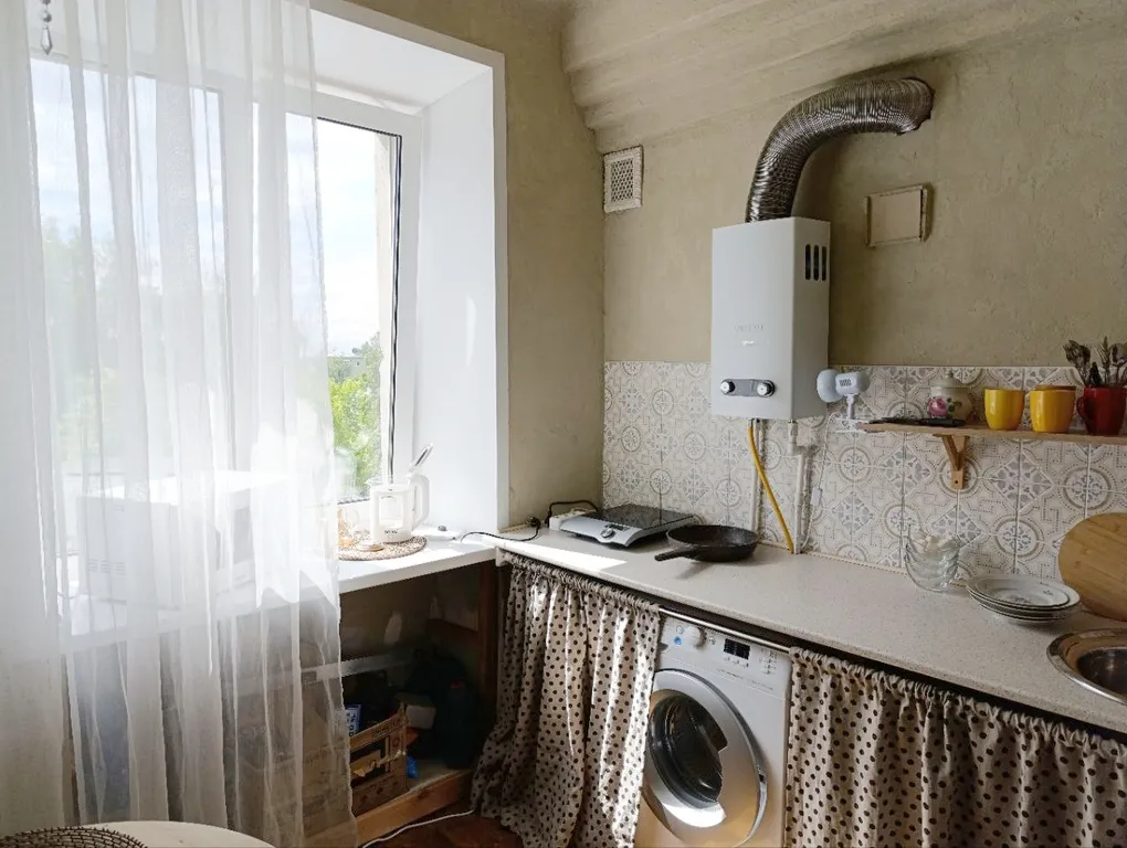 Однушка с видом на город и небо