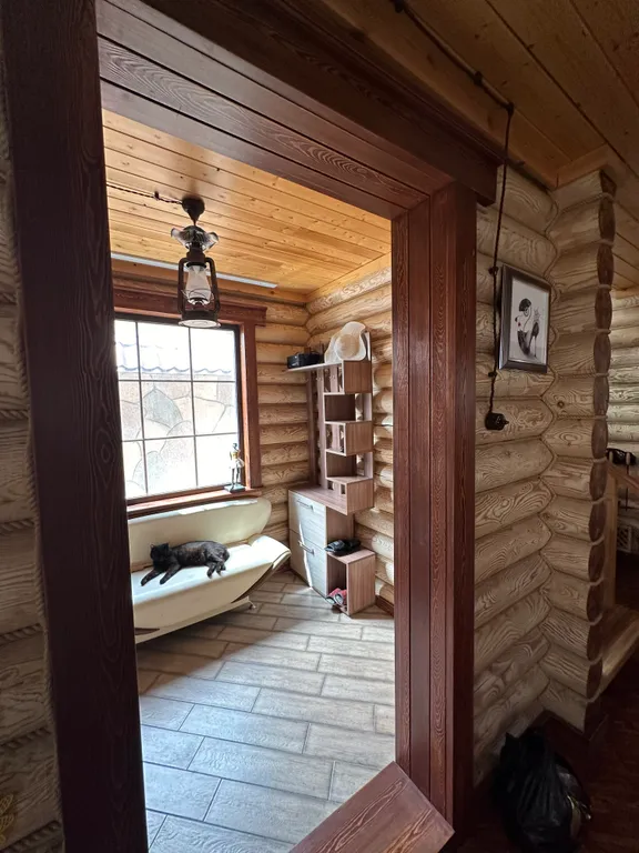 Дом из бруса на берегу моря с зоной барбекю и собственной парной