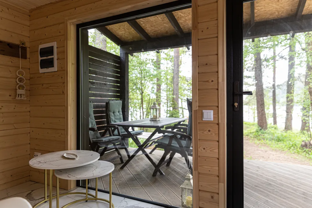 Стильный дом на берегу Ладожского озера с панорамным видом