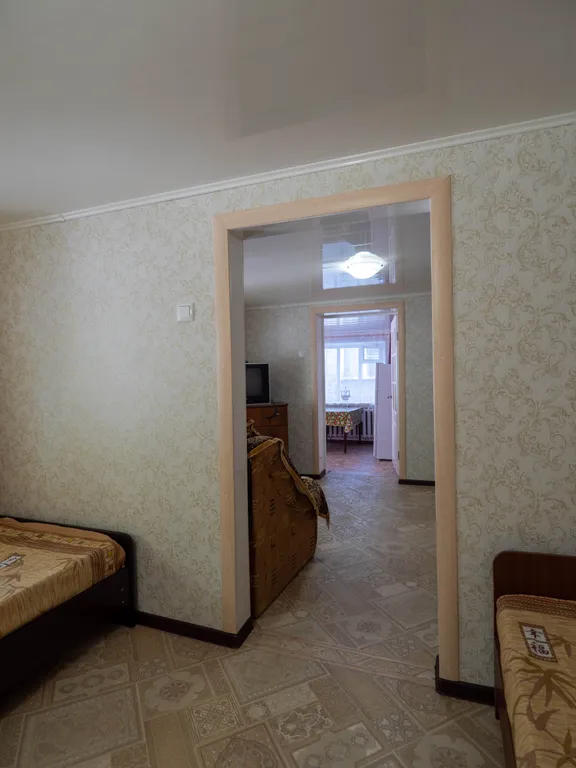 Уютный домик в беседках винограда