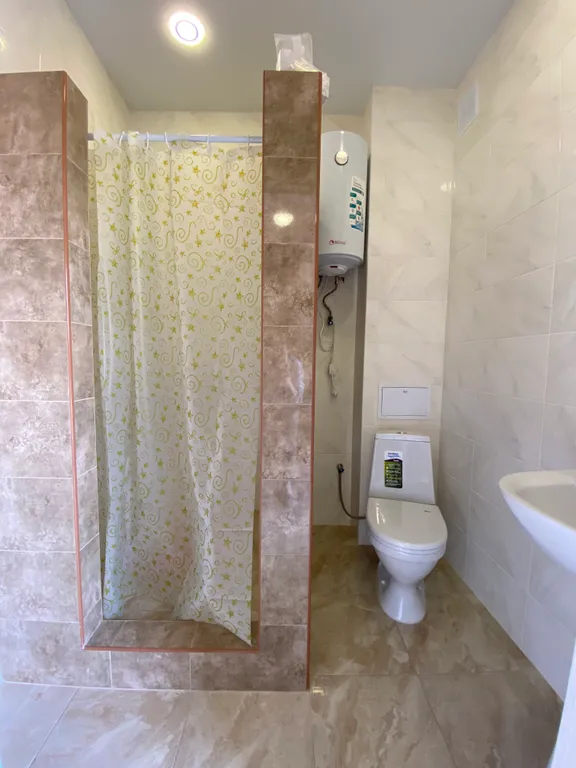 Двухкомнатный номер с кухней и санузлом