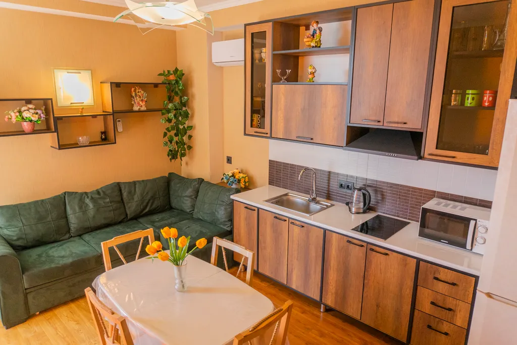 Уютная квартира с большим балконом и видом на город