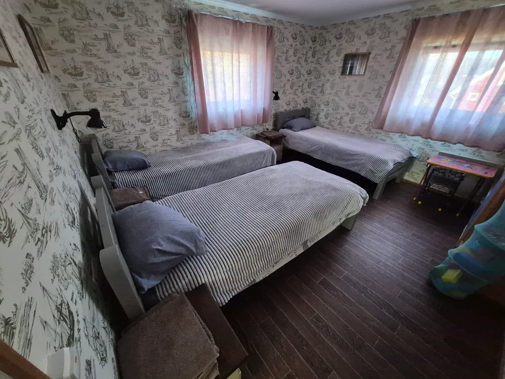 Гостевой уютный дом Соль Севера с баней на берегу залива Ура