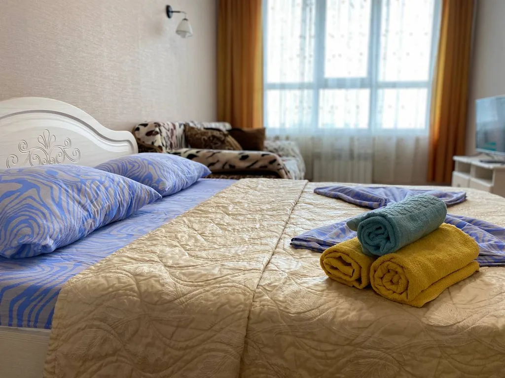 Уютная квартира с ортопедическим матрасом и панорамным балконом