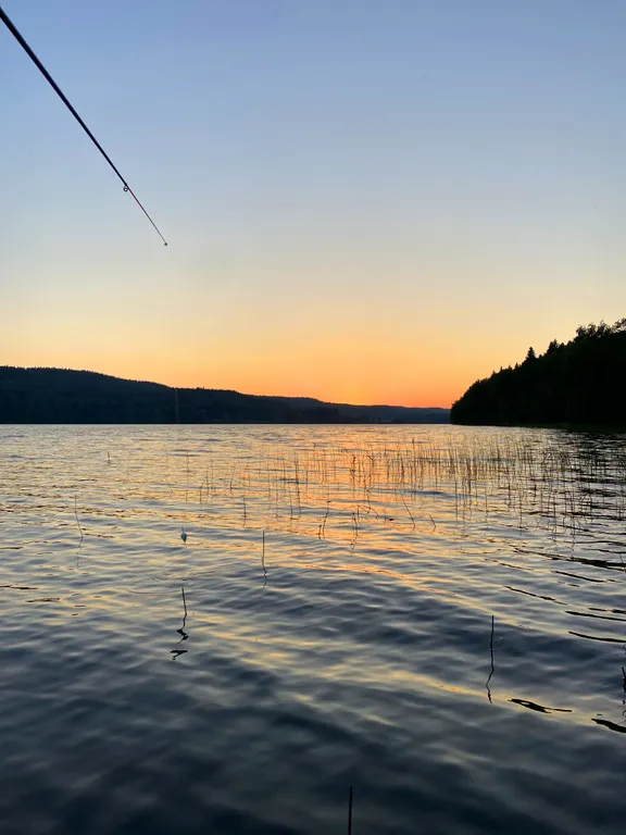 Отдых на берегу озера с видом на горнолыжный курорт и сауной в доме
