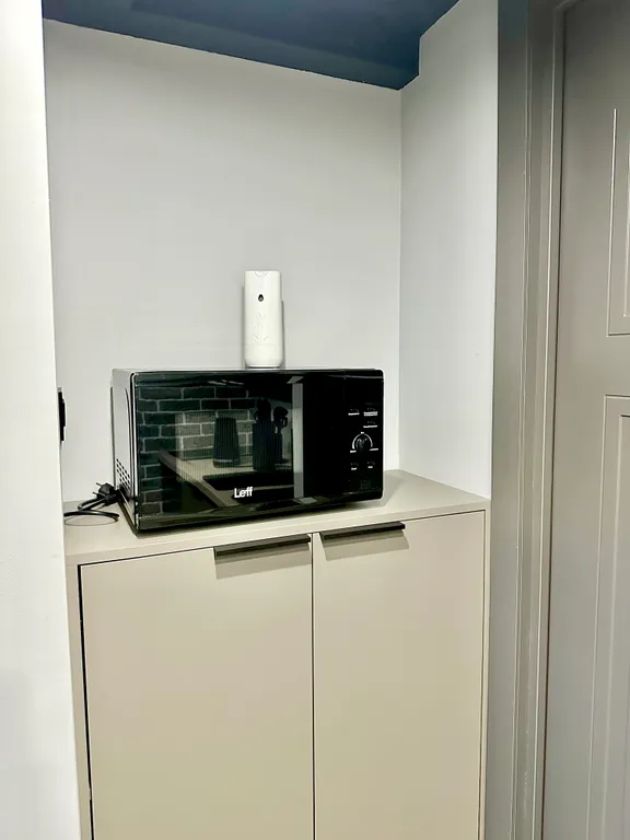 Двухуровневая студия с дизайнерским ремонтом в стиле лофт