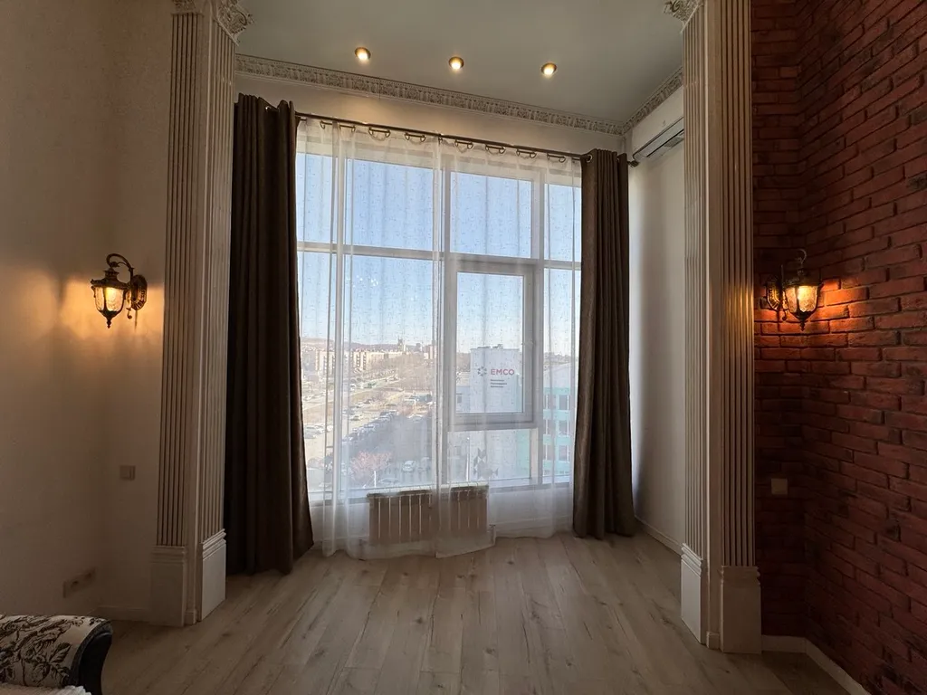 Двухуровневая стильная и комфортабельная квартира