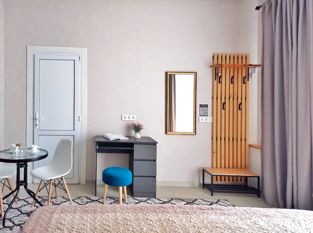 Комфортный семейный номер-студия с видом на горы