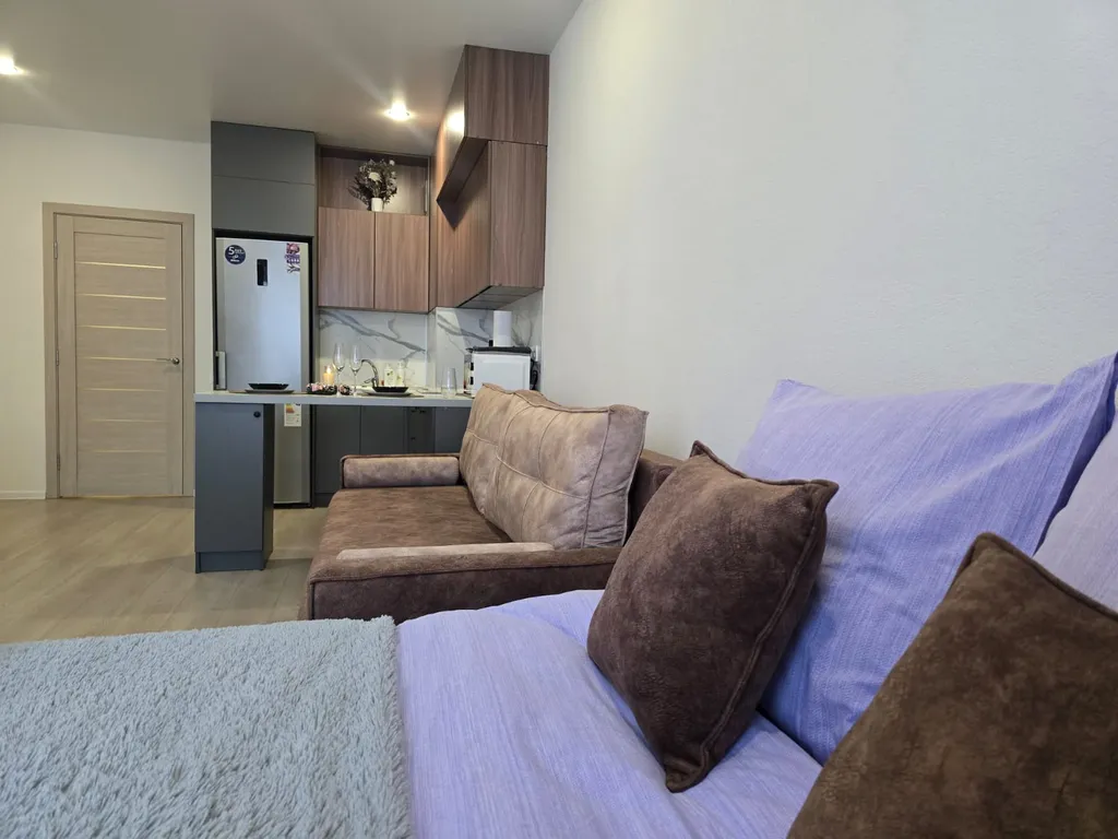 Уютная студия с видом на город