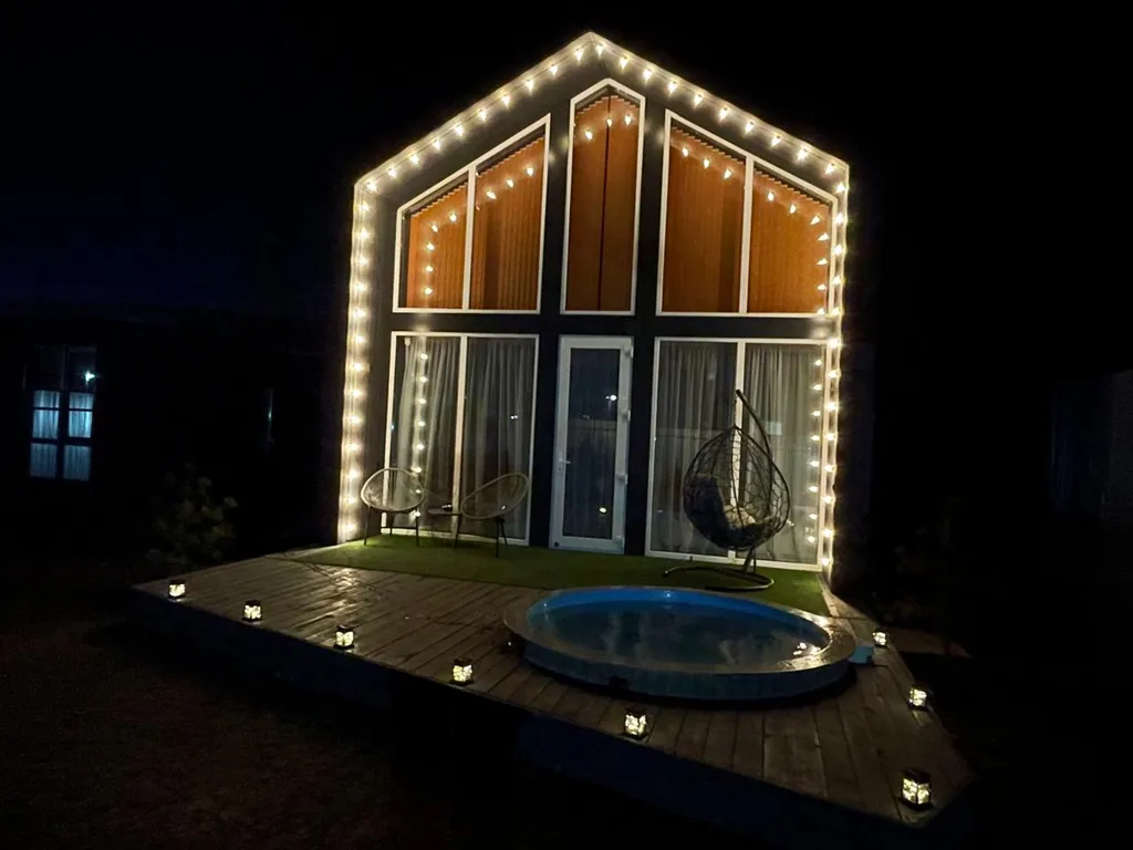 Дом в стиле барнхаус с тёплым бассейном и сауной