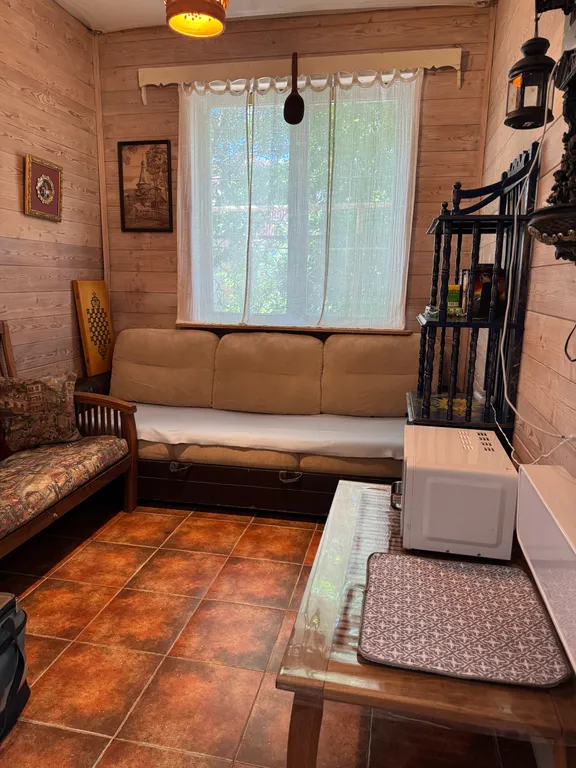 Дом с верандой в саду