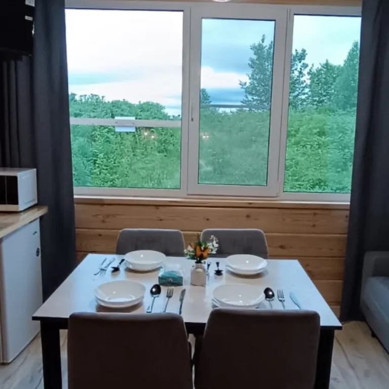 Дома для отдыха "Ипиней" С видами на домашние вулканы, город, бухту