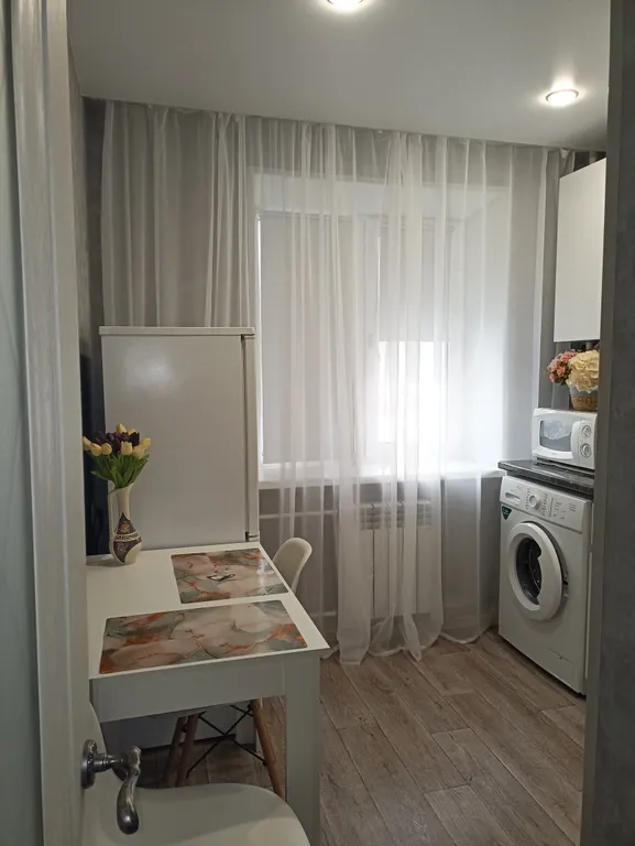 1-комнатная квартира в центре города с асфальтированной парковкой