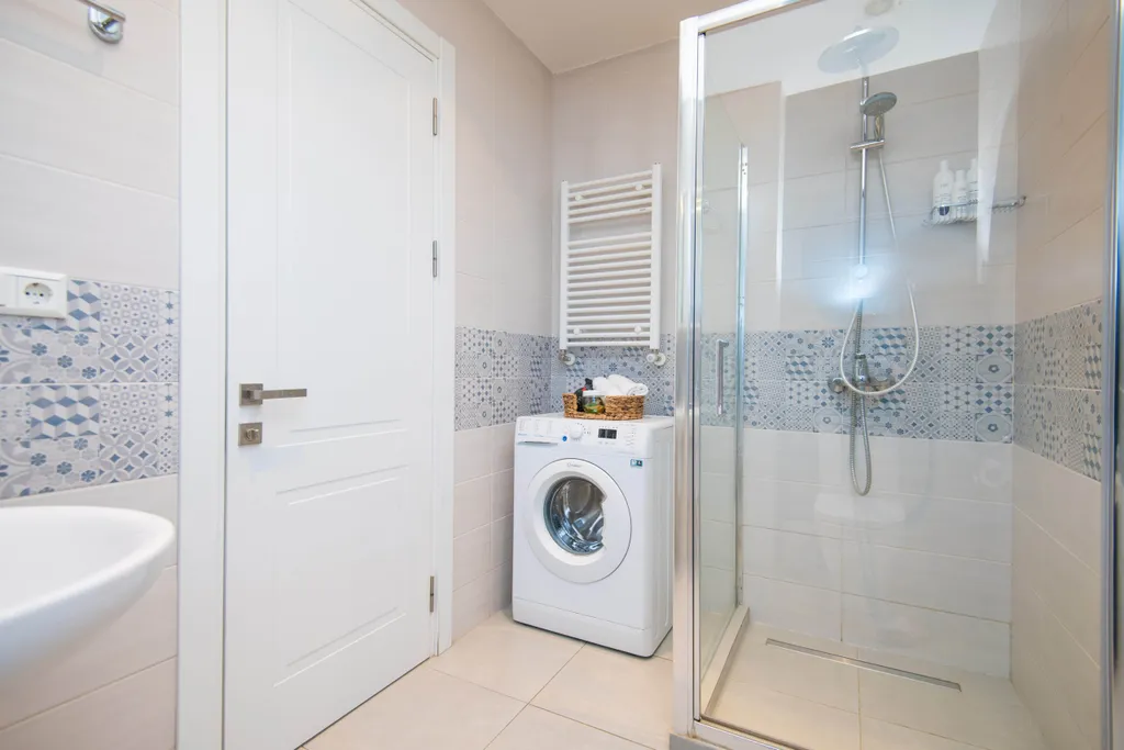 Уютные апартаменты с видом на колесо обозрения и город