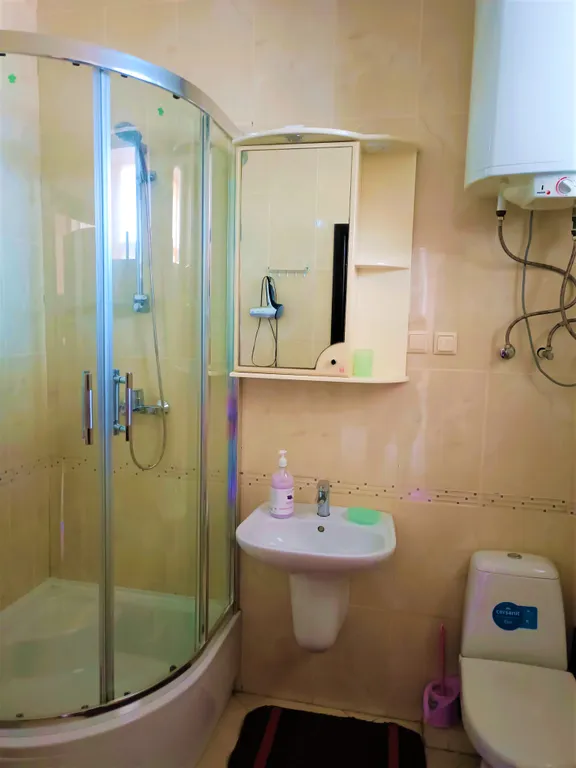 Семейный апартамент с зеленым патио у моря